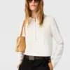 Arlesa blus med dubbel slits och dragkedja Arlesa blus med dubbel slits och dragkedja