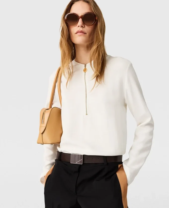 Arlesa blus med dubbel slits och dragkedja Arlesa blus med dubbel slits och dragkedja