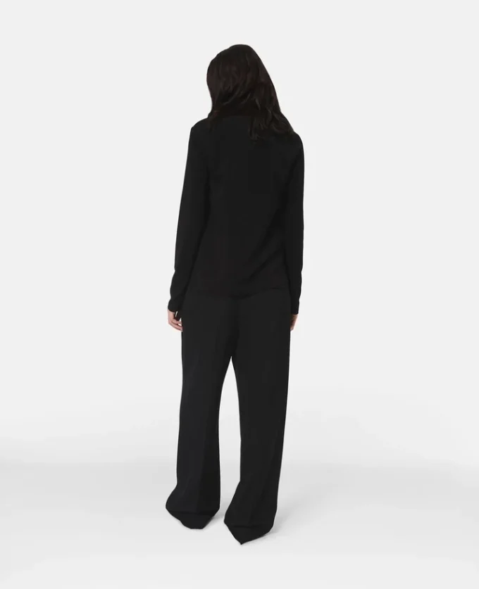 Arlesa blus med dubbel slits och dragkedja