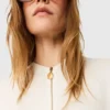 Arlesa blus med dubbel slits och dragkedja Arlesa blus med dubbel slits och dragkedja