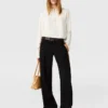 Arlesa blus med dubbel slits och dragkedja Arlesa blus med dubbel slits och dragkedja