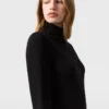 Asymmetrisk cape-midiklänning