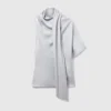 Asymmetrisk topp med knytning i halsen Asymmetrisk topp med knytning i halsen