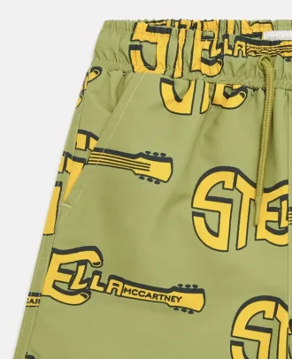 Badshorts med gitarrmönster
