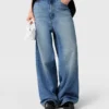 Blekta högmidjade jeans med vida ben