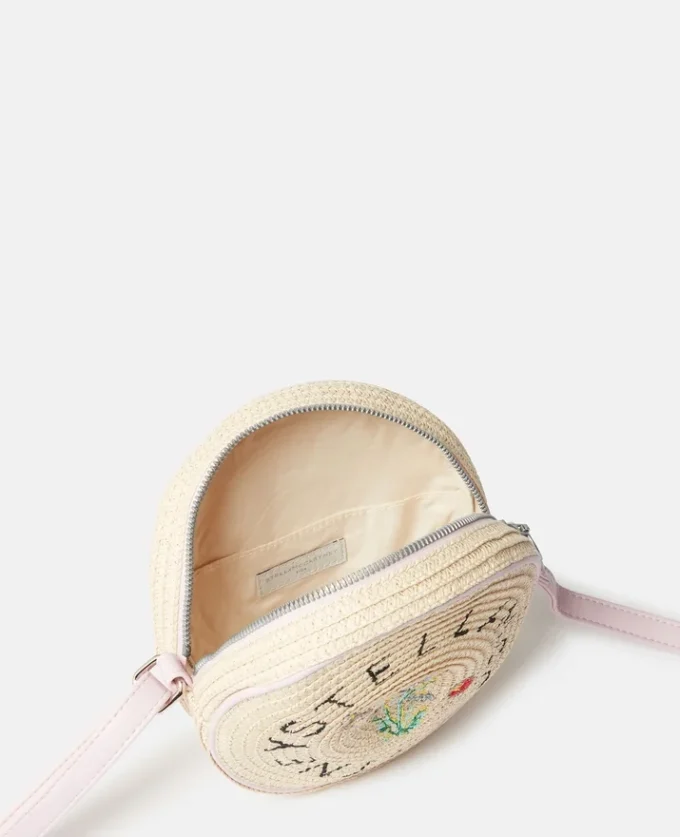 Blombroderad crossbody-väska i strå Blombroderad crossbody-väska i strå