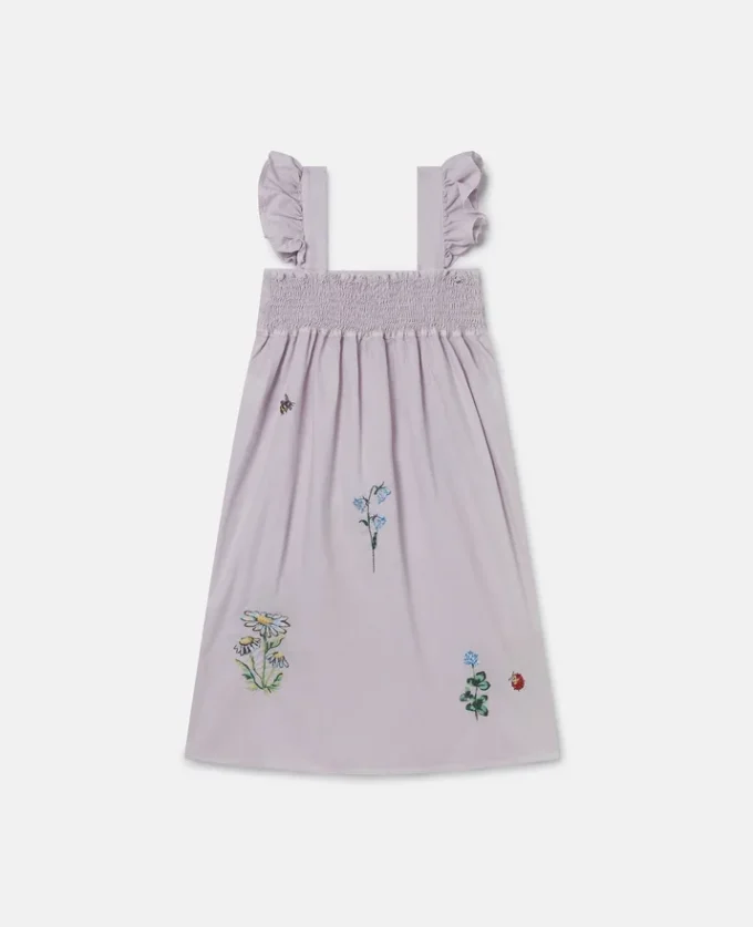 Blommig broderad ärmlös klänning Blommig broderad ärmlös klänning