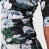 Blommig mesh-top med trekvartsärmar Blommig mesh-top med trekvartsärmar