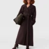 Dubbelvävd trenchcoat med bälte Dubbelvävd trenchcoat med bälte
