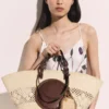Falabella Raffia AirPods-fodral nyckelring Falabella Raffia AirPods-fodral nyckelring