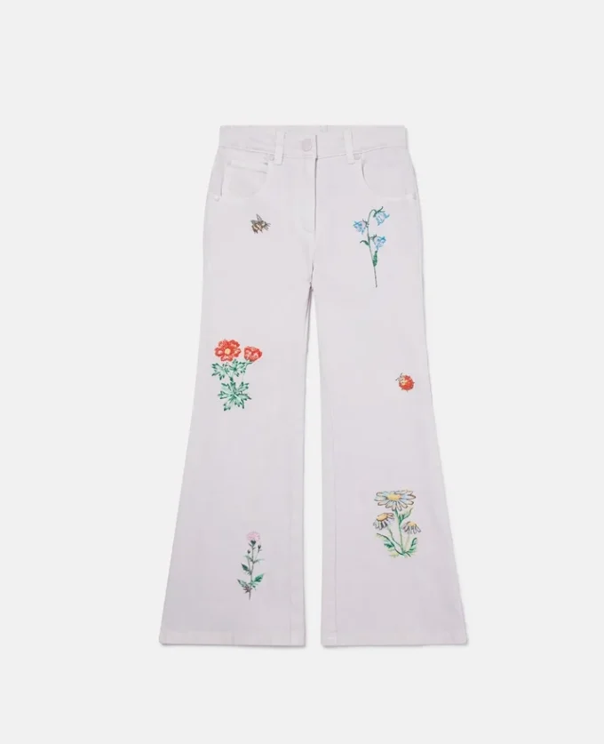 Jeans med broderad blomma