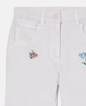 Jeans med broderad blomma