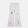 Jeans med broderad blomma