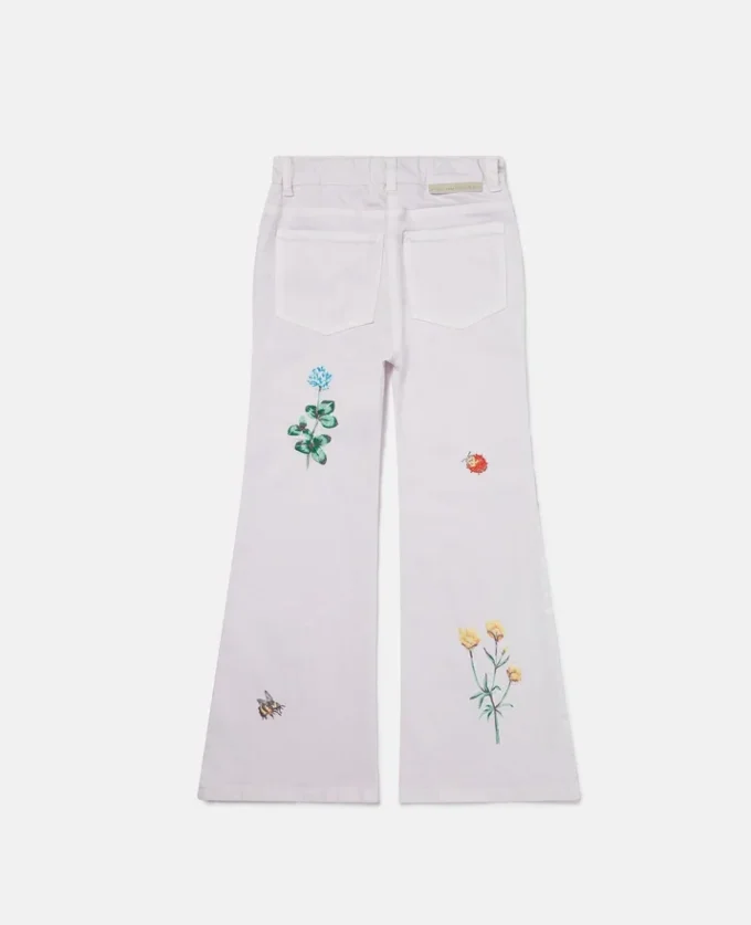 Jeans med broderad blomma
