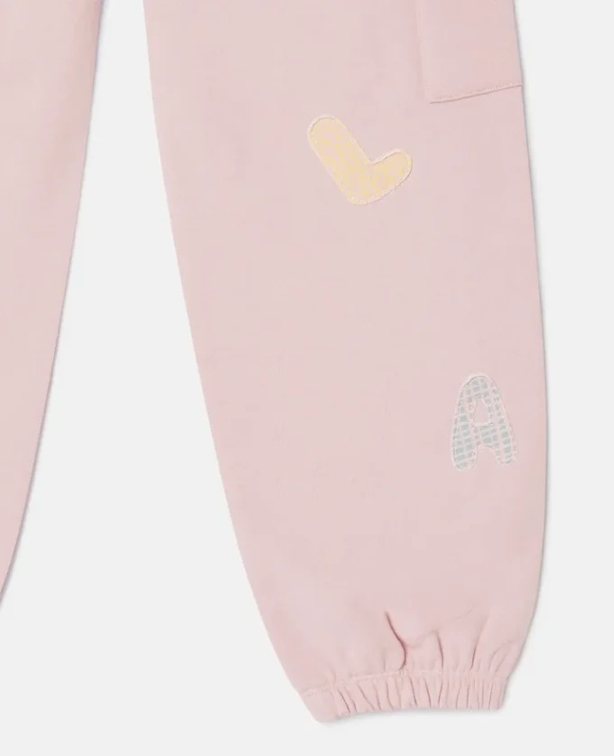 Joggingbyxor med dragsko och broderad logotyp Joggingbyxor med dragsko och broderad logotyp