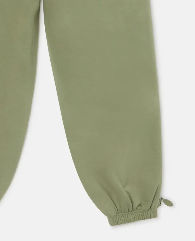Joggingbyxor med dragsko och logomedaljong
