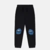 Joggingbyxor med monsterknäplåster Joggingbyxor med monsterknäplåster