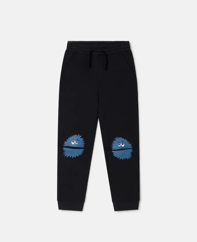 Joggingbyxor med monsterknäplåster Joggingbyxor med monsterknäplåster