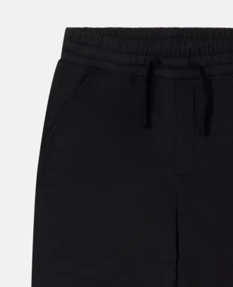 Joggingbyxor med monsterknäplåster