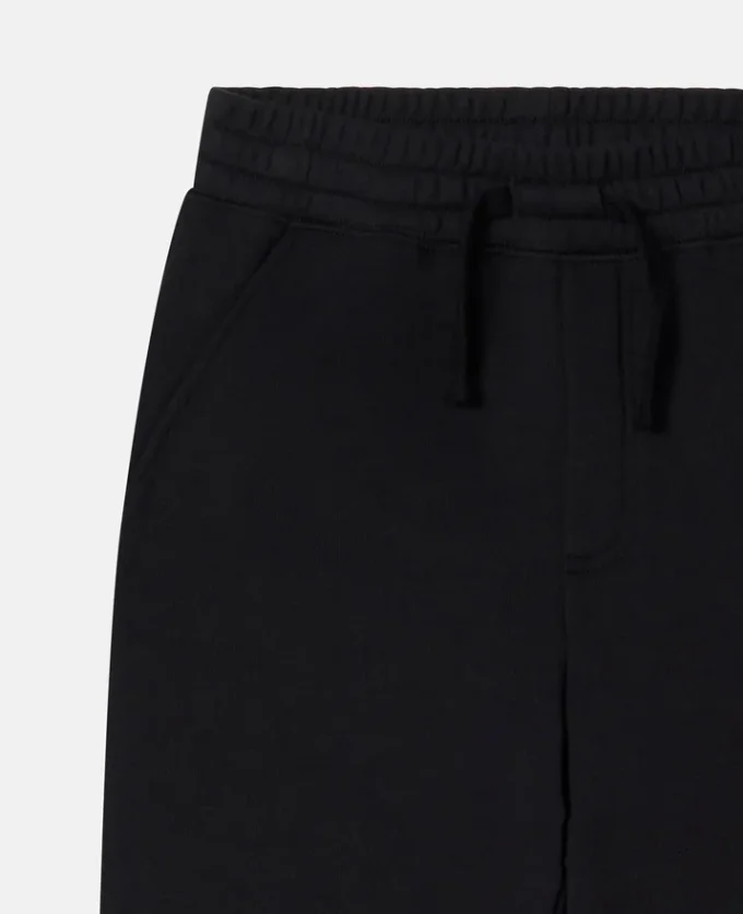 Joggingbyxor med monsterknäplåster Joggingbyxor med monsterknäplåster