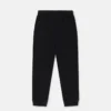 Joggingbyxor med monsterknäplåster Joggingbyxor med monsterknäplåster