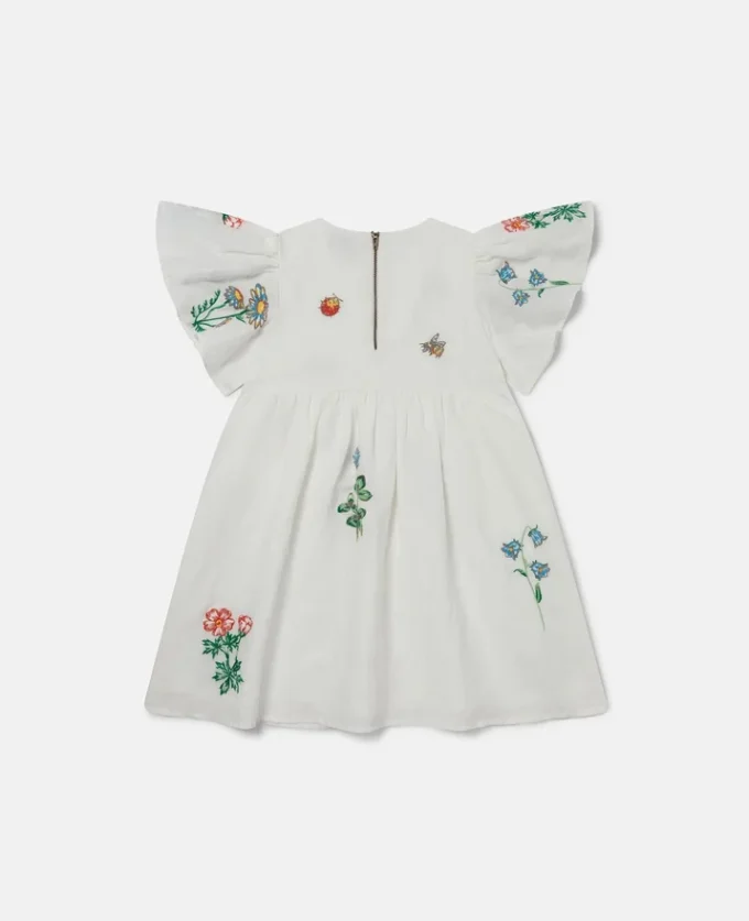 Klänning med blommig broderi och korta ärmar