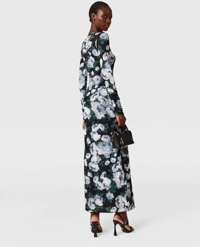 Långärmad midiklänning i mesh med blommönster Långärmad midiklänning i mesh med blommönster