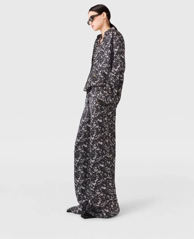 Oversized byxor med snörning och spetsmönster