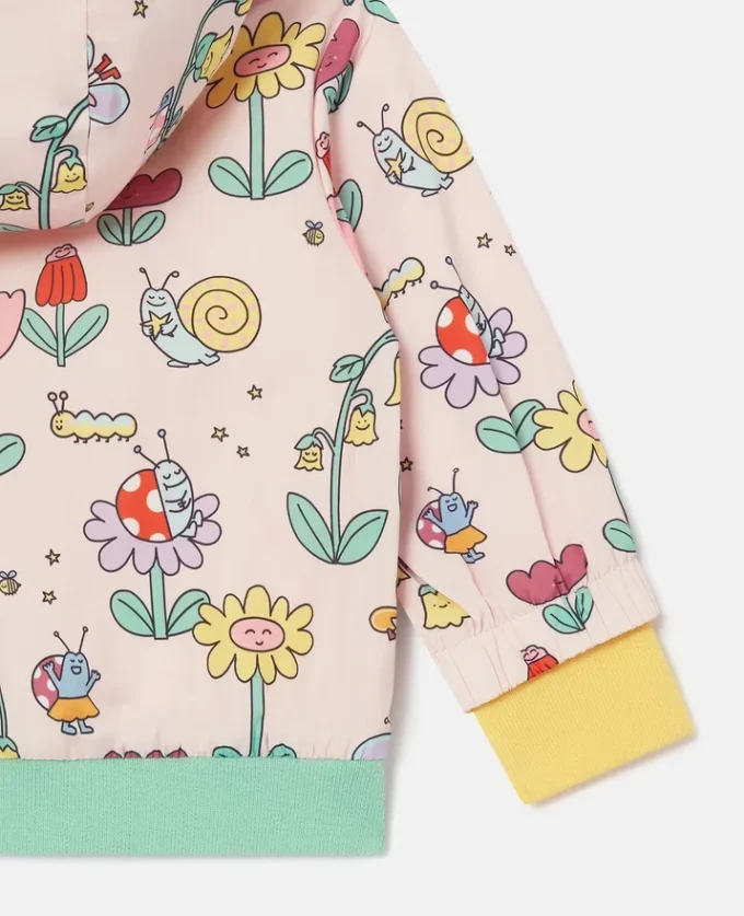 Regnjacka med huva och blommönster
