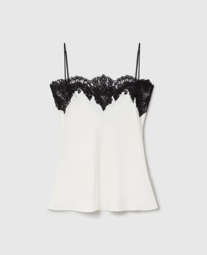 Ärmlös topp i spets och satin Ärmlös topp i spets och satin