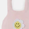 Romper med broderade blommor