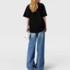 Blekta högmidjade jeans med vida ben