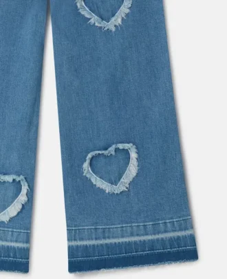 Stretchjeans med fransade hjärtlapper