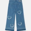 Stretchjeans med fransade hjärtlapper