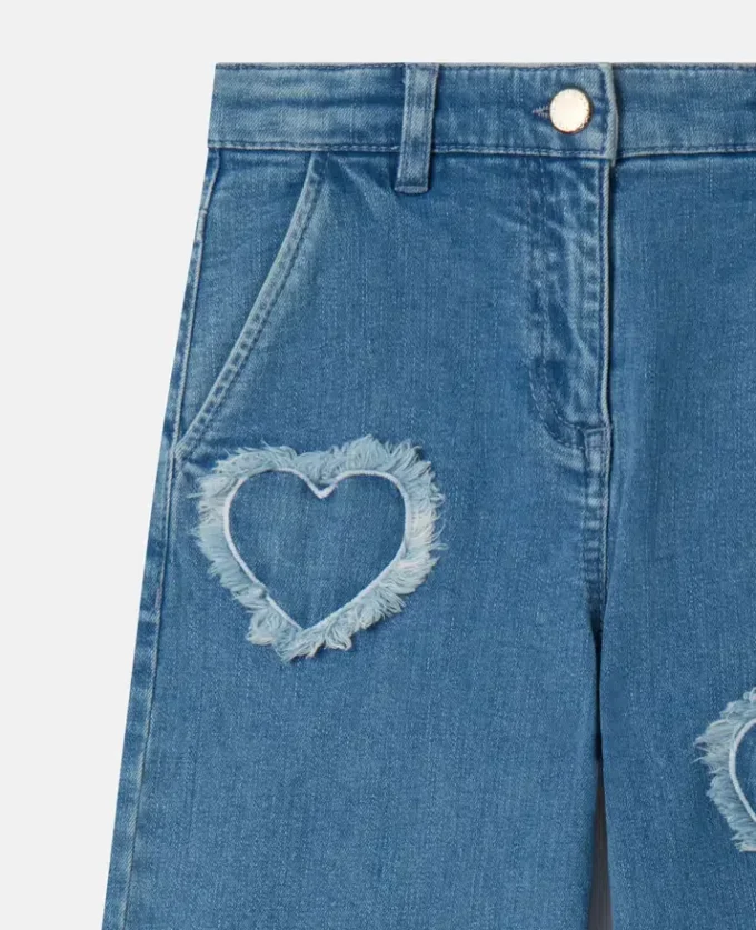 Stretchjeans med fransade hjärtlapper
