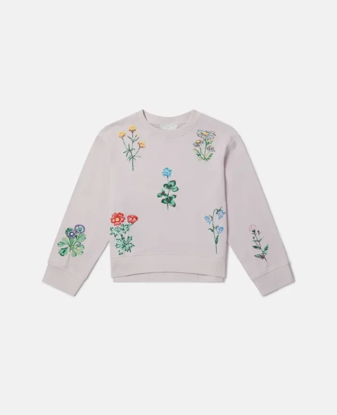 Sweatshirt med broderad blomma