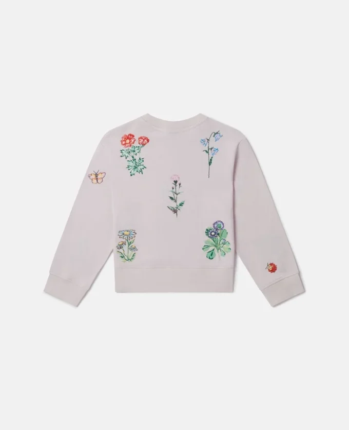 Sweatshirt med broderad blomma