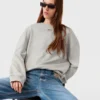 Sweatshirt med logotypsmycke Sweatshirt med logotypsmycke