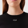 T-shirt med logotypsmycke T-shirt med logotypsmycke