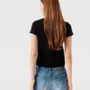 T-shirt med logotypsmycke T-shirt med logotypsmycke