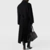 Trenchcoat med bälte och tonad spänne