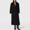 Trenchcoat med bälte och tonad spänne