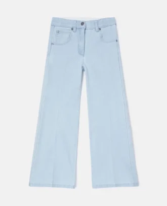 Utställda ljusblå jeans