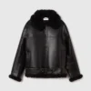 Vegansk jacka med bälte i shearling Vegansk jacka med bälte i shearling