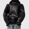 Vegansk jacka med bälte i shearling Vegansk jacka med bälte i shearling